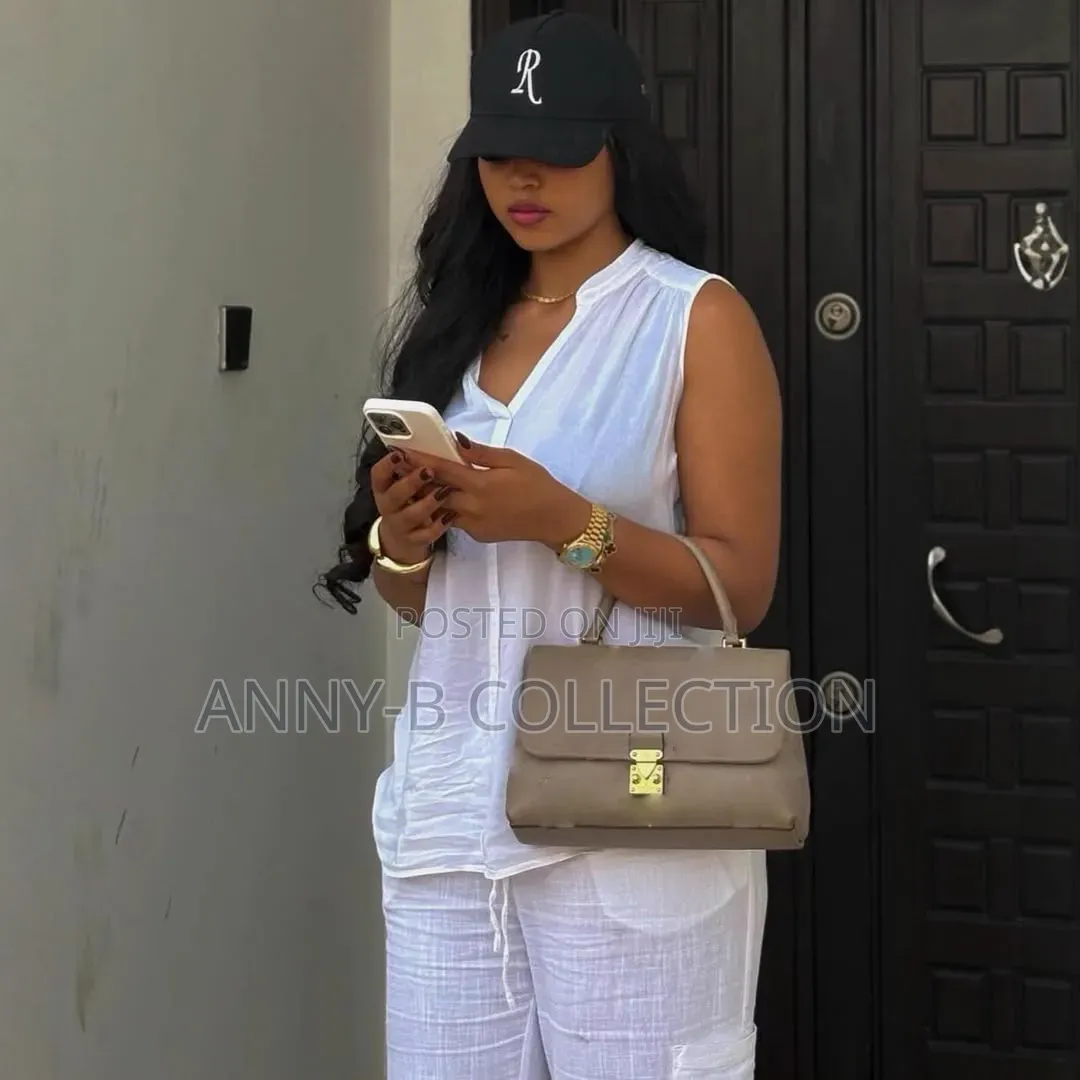 Quality Armless Ladies White Two Piece