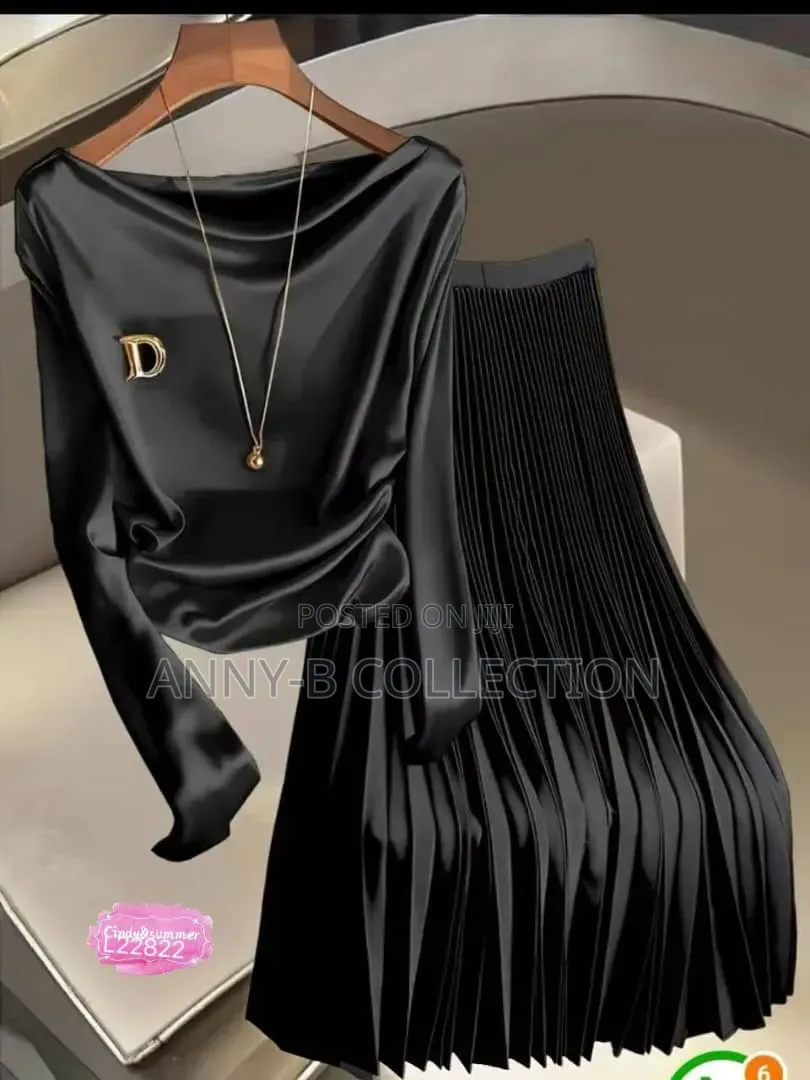 Quality Ladies Top and Pleated Skirt