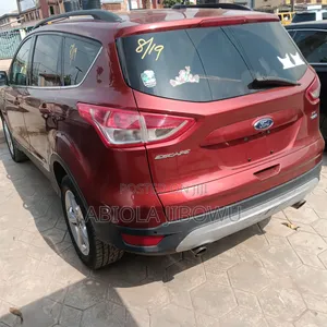 Ford Escape SE 4dr SUV AWD (1.6L 4cyl Turbo 6A) 2015 Orange