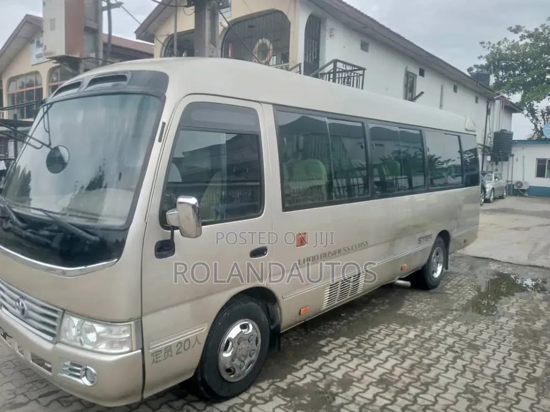 Toyota Coaster 2009 Gold