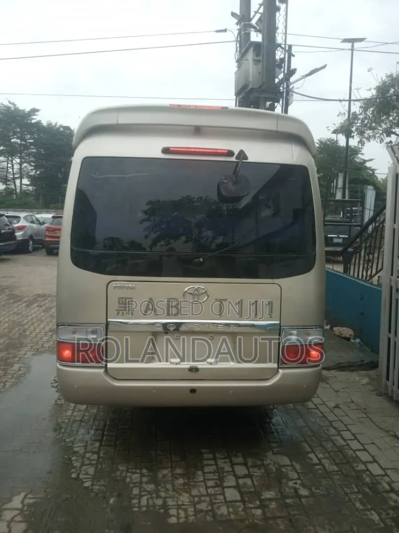 Toyota Coaster 2009 Gold