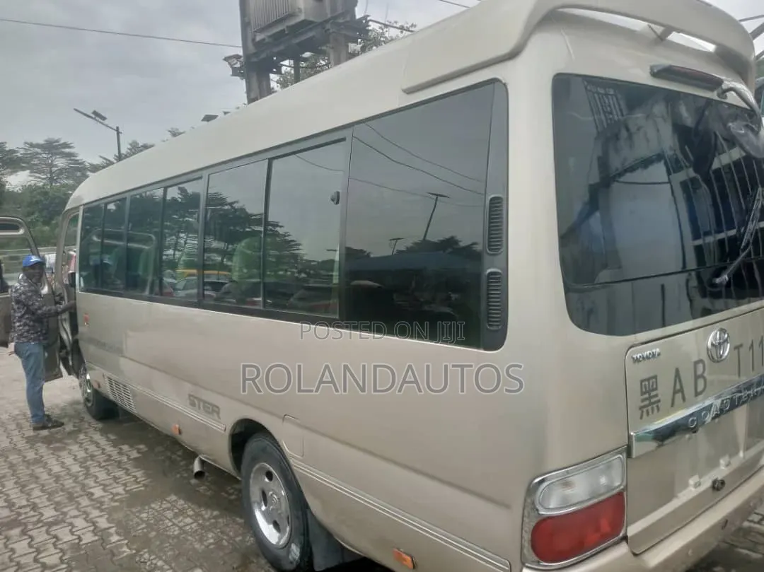 Toyota Coaster 2009 Gold