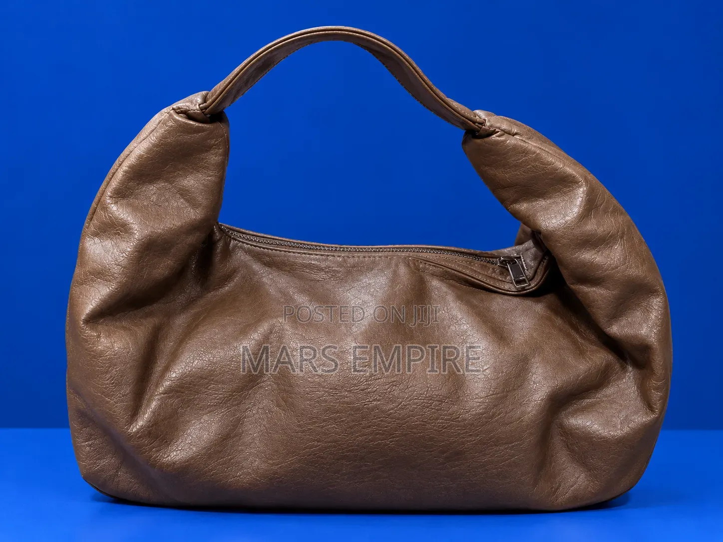 Brown Leather Travel Bag - N18,000. -Lugbe Abuja