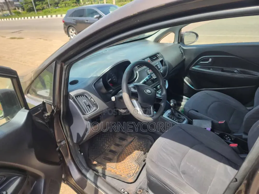 Kia Rio EX 4dr Sedan (1.6L 4cyl 6A) 2014 Brown