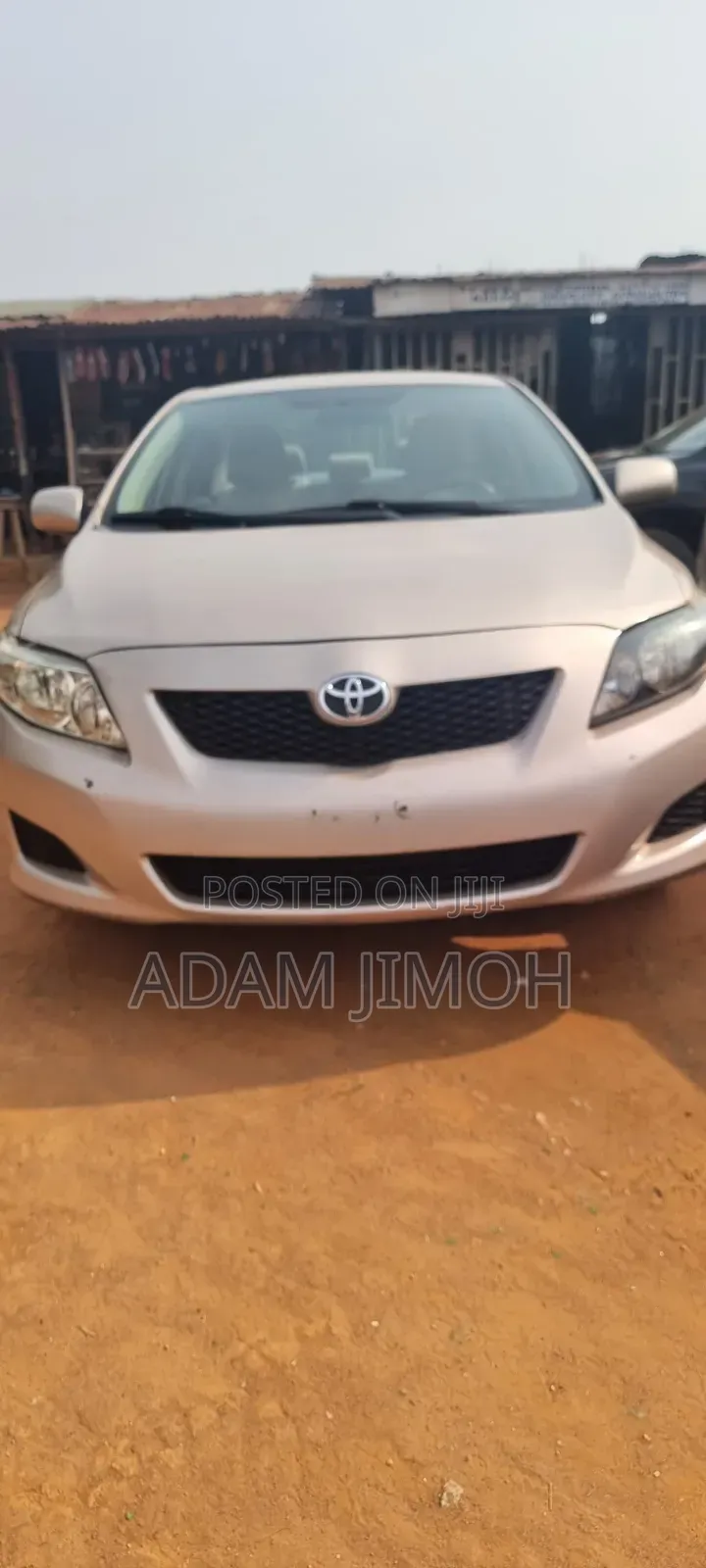 Toyota Corolla Base 4dr Sedan (1.8L 4cyl 5M) 2010 Gold