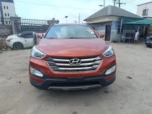 Hyundai Santa Fe Limited 4dr SUV AWD (3.3L 6cyl 6A) 2014 Orange