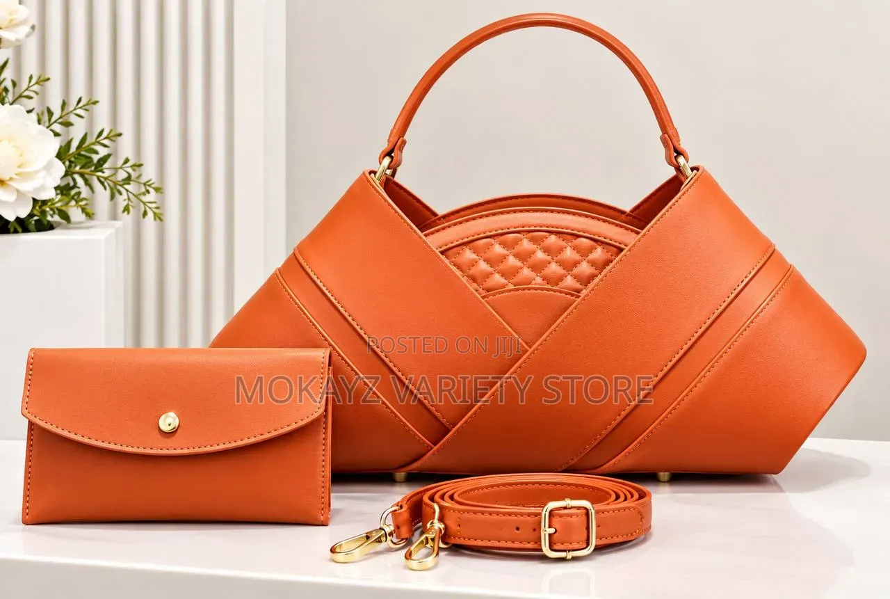 Classique Quilted v Shape Statement Leather Handbag With Mini Purse
