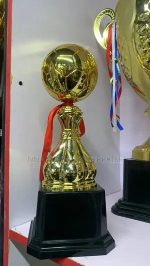 Golden Football Trophy Featuring a Glossy Soccer Ball