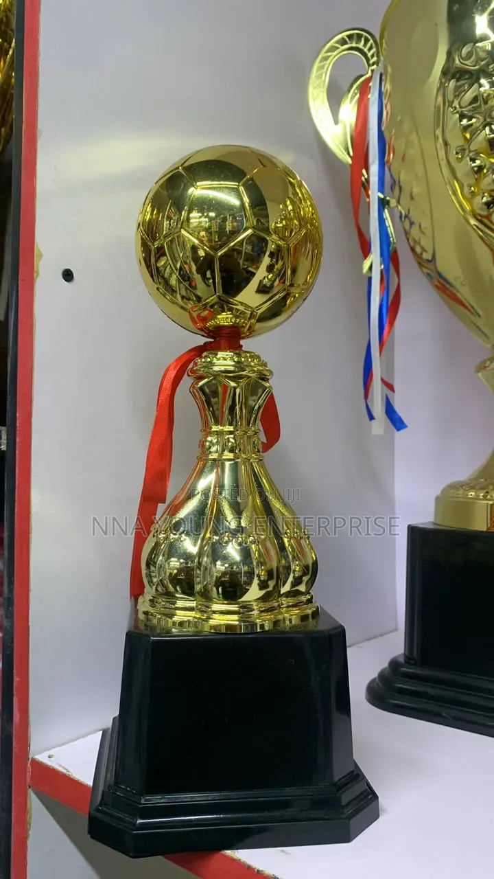 Golden Football Trophy Featuring a Glossy Soccer Ball