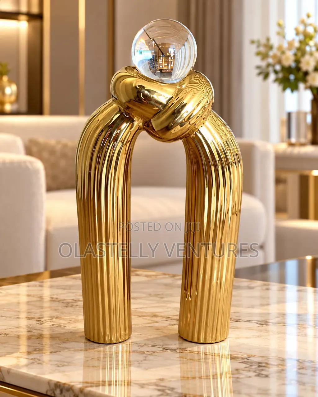 Gold Ribbed Knot Decor
Tem