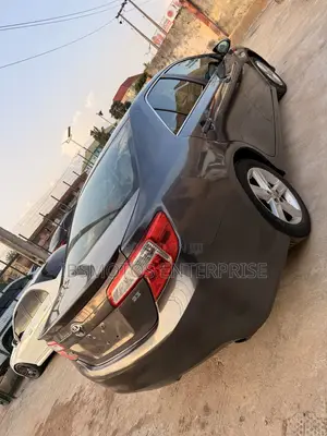 Toyota Camry SE Sport 4dr Sedan w/Prod. End 11/13 (2.5L 4cyl 6A) 2014