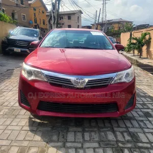 Toyota Camry LE 4dr Sedan w/Prod. End 11/13 (2.5L 4cyl 6A) 2014 Red