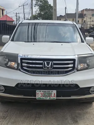 Honda Pilot Touring w/RES/Navi 4WD (3.5L 6cyl 5A) 2012 White