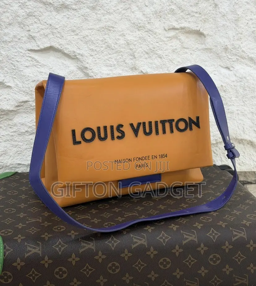 Louis Vuitton Orange Leather Messenger Bag With Purple Shoulder Strap