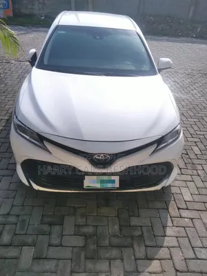 Toyota Camry LE (2.5L 4cyl 8A) 2019 White