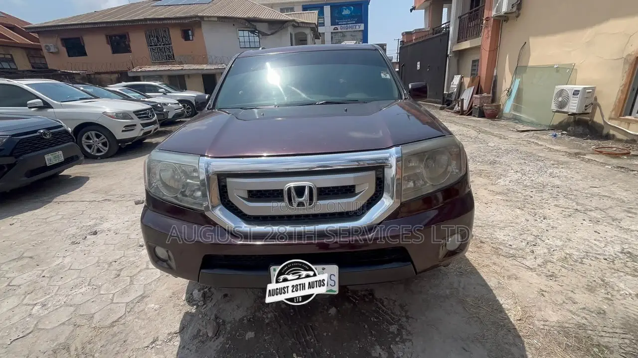 Honda Pilot Touring w/RES/Navi FWD (3.5L 6cyl 5A) 2012 Brown
