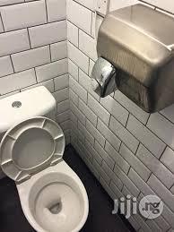 Modern Hand Dryer In Toilet