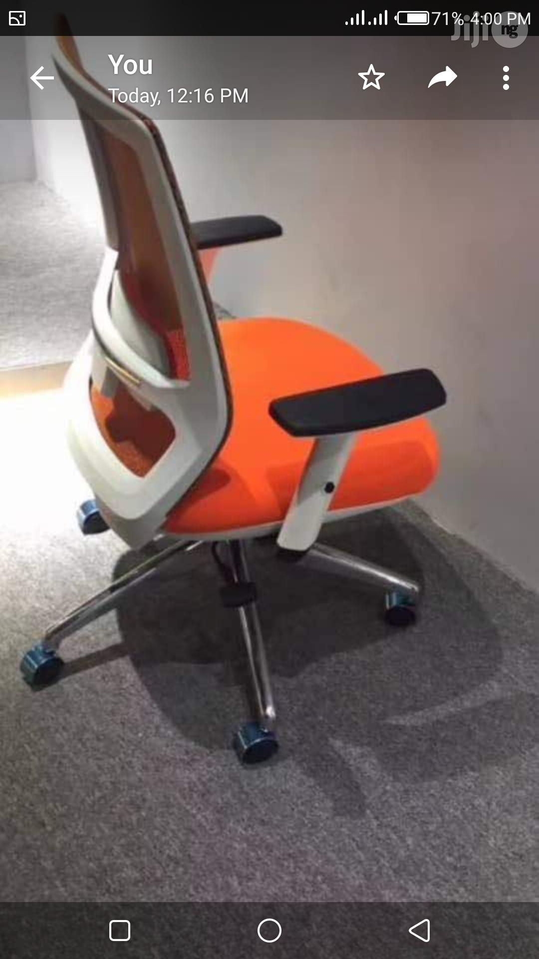 Orange Mesh Swivel Chair