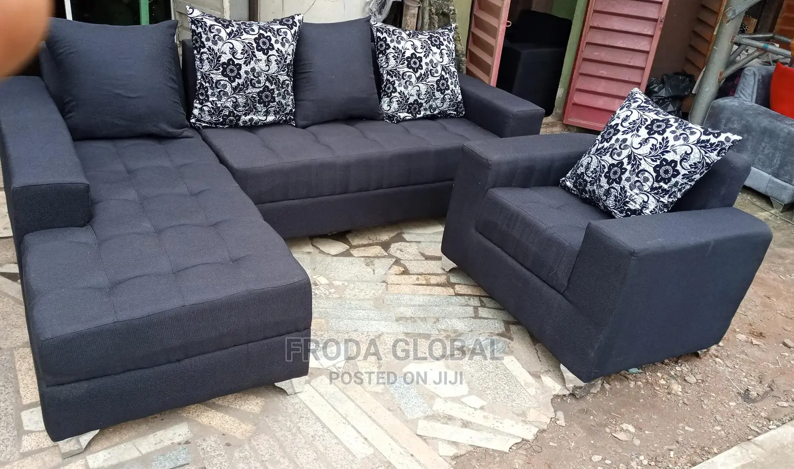 Black Fabric L-Shape Sofa With Single Chair and Pillows