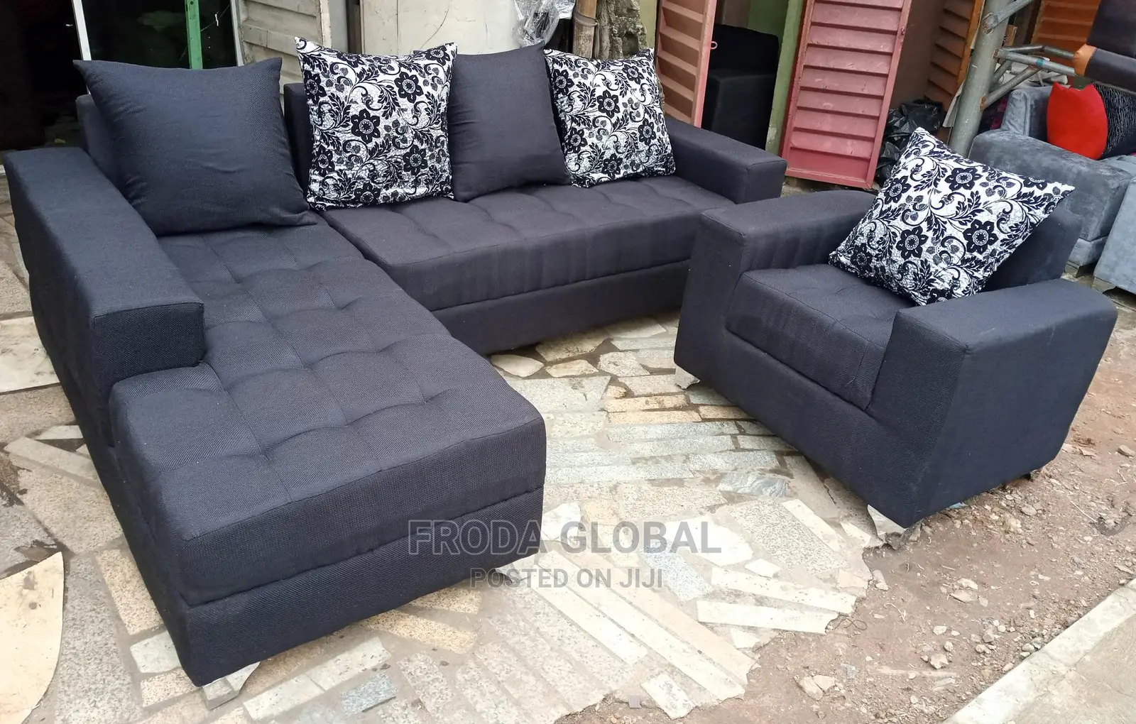 Black Fabric L-Shape Sofa With Single Chair and Pillows