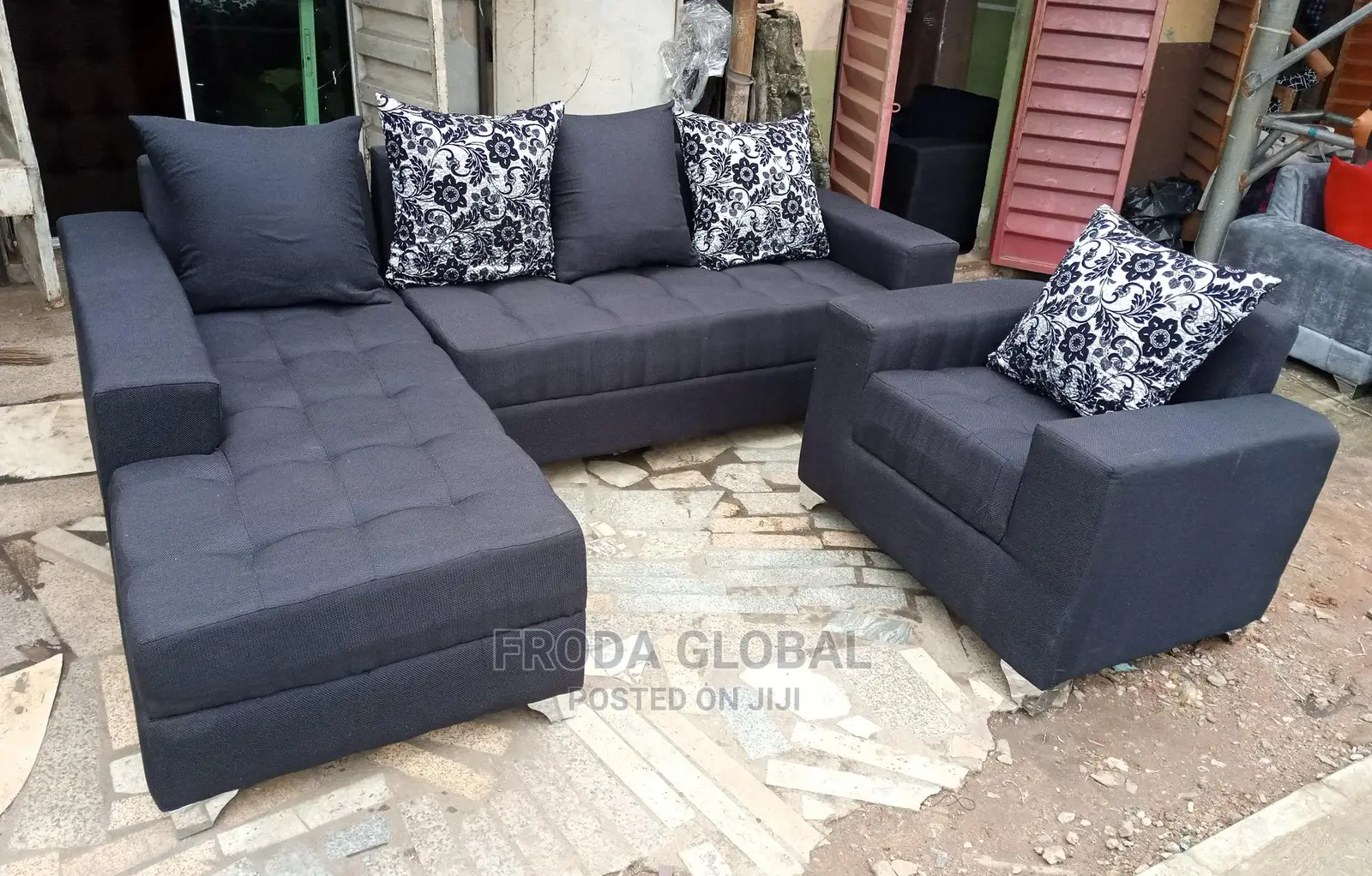 Black Fabric L-Shape Sofa With Single Chair and Pillows