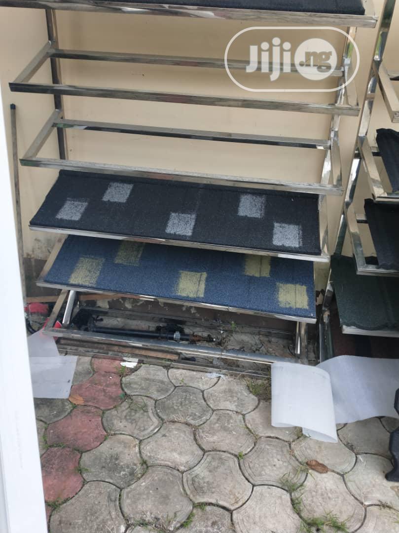 Burgundy Stone Coated Roofing Materials From Mango Roof.