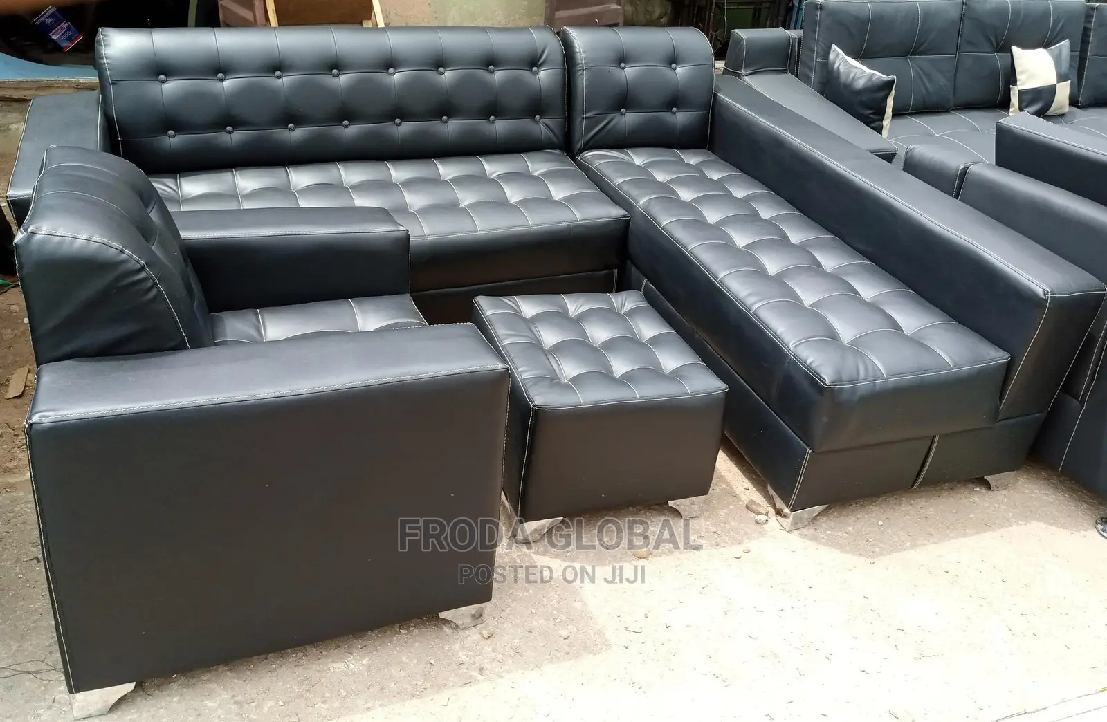 L-Shaped Sofa With a Single Chair and Ottoman. Leather Couc