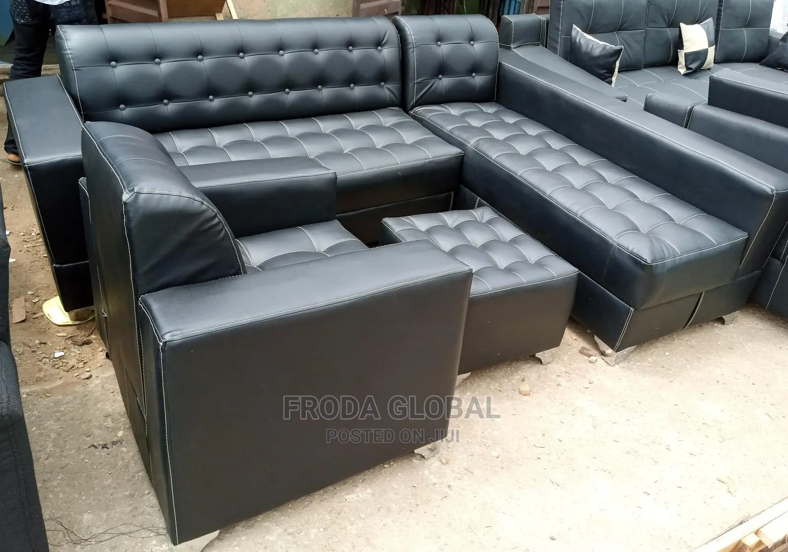 L-Shaped Sofa With a Single Chair and Ottoman. Leather Couc