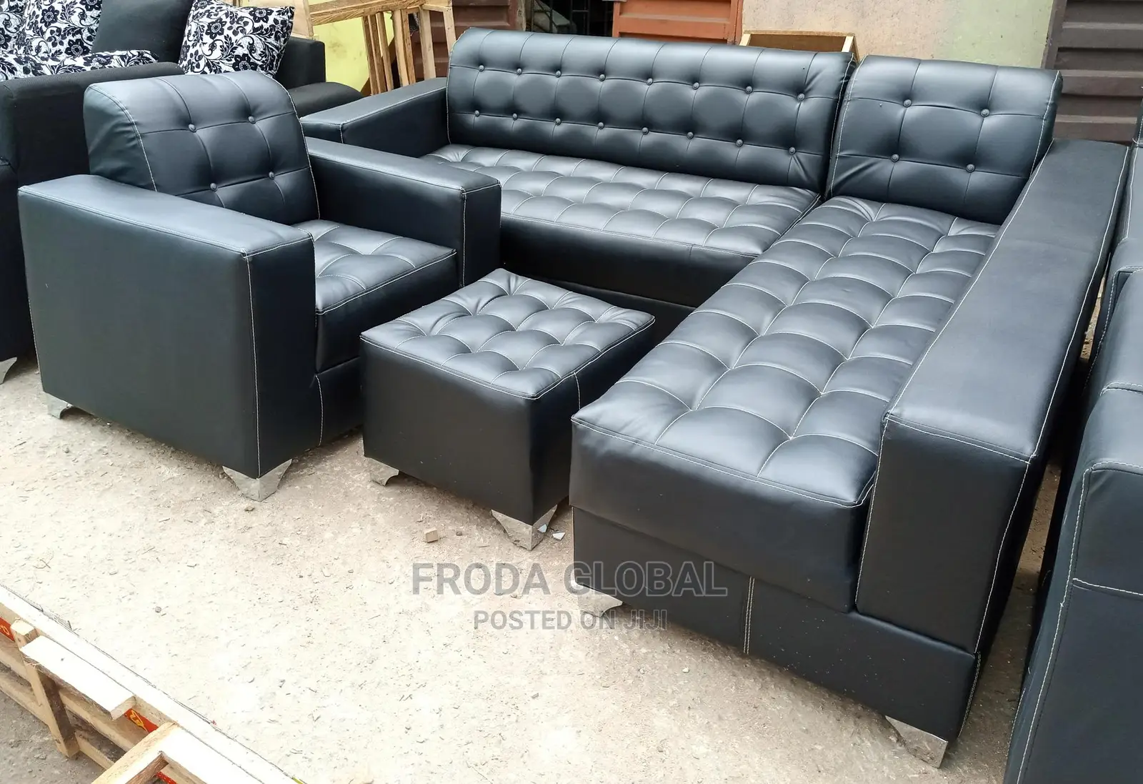 L-Shaped Sofa With a Single Chair and Ottoman. Leather Couc
