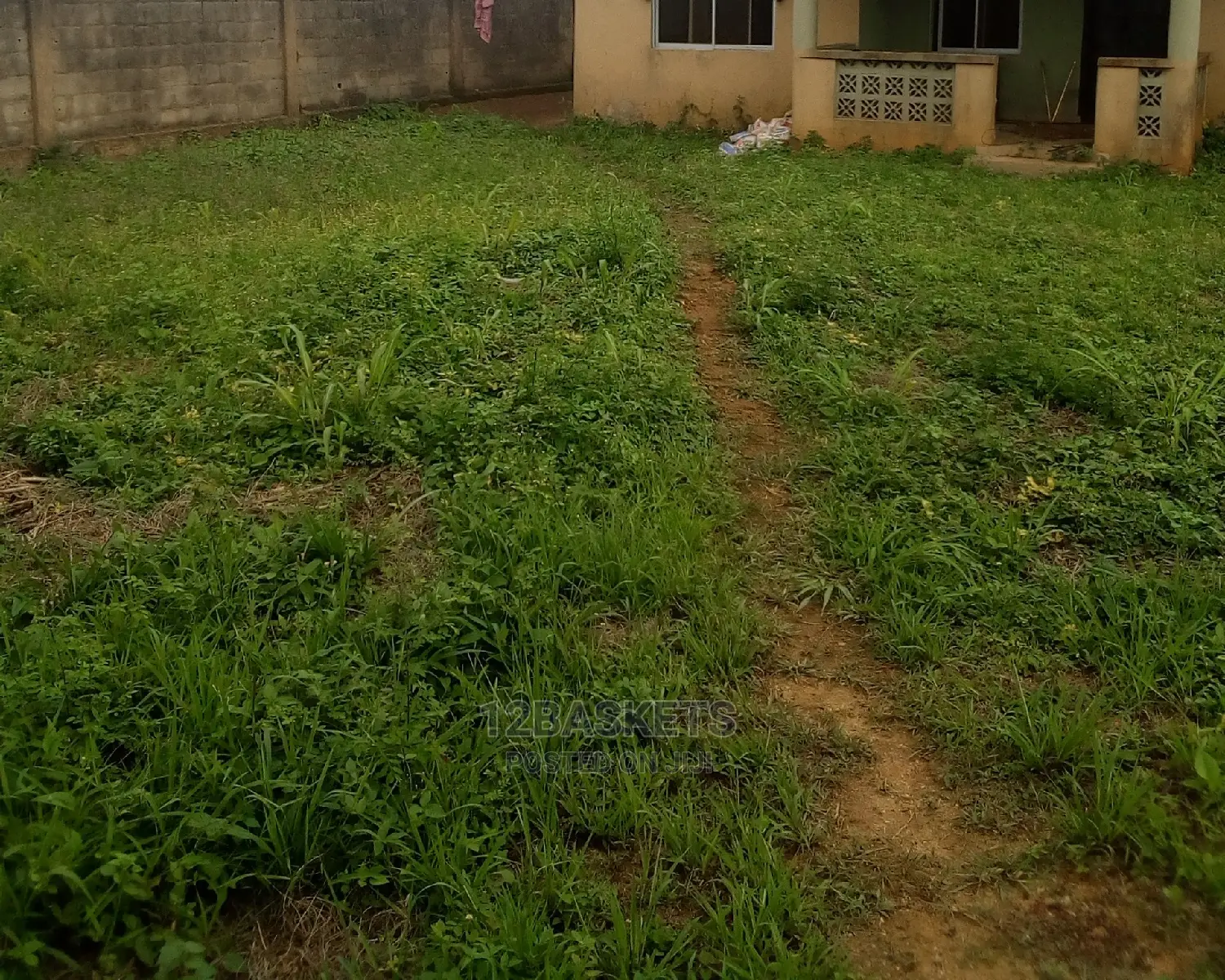 Half Plot of Land at Journalist Estate, Arepo.