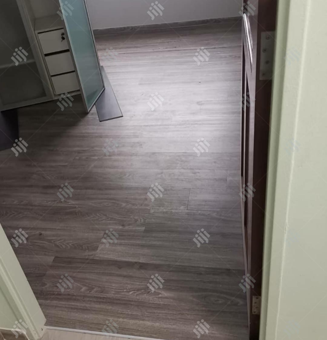 Korean Vinyl Pvc Wood-Like Floor. Can Be Laid on Ceramic
