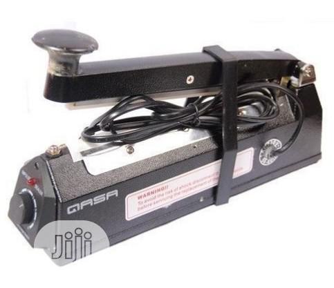 QASA Sealing Machine