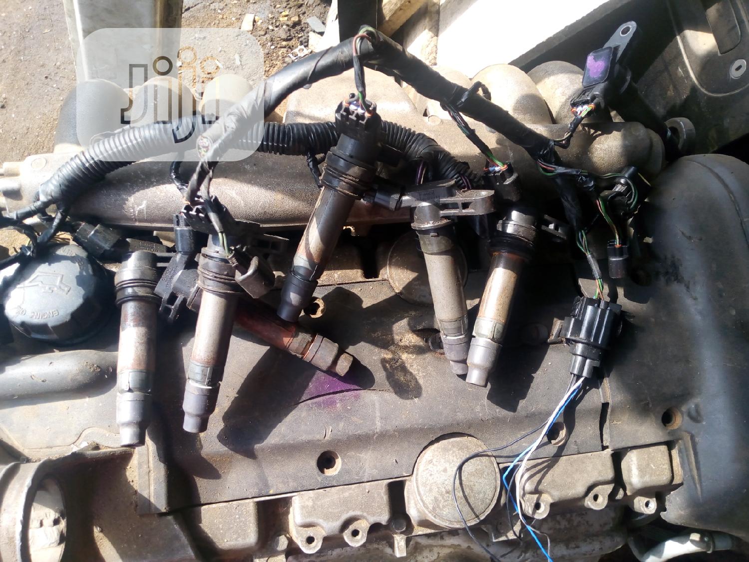 6 Pics 06-012 Volvo 3.2 Engine Coil