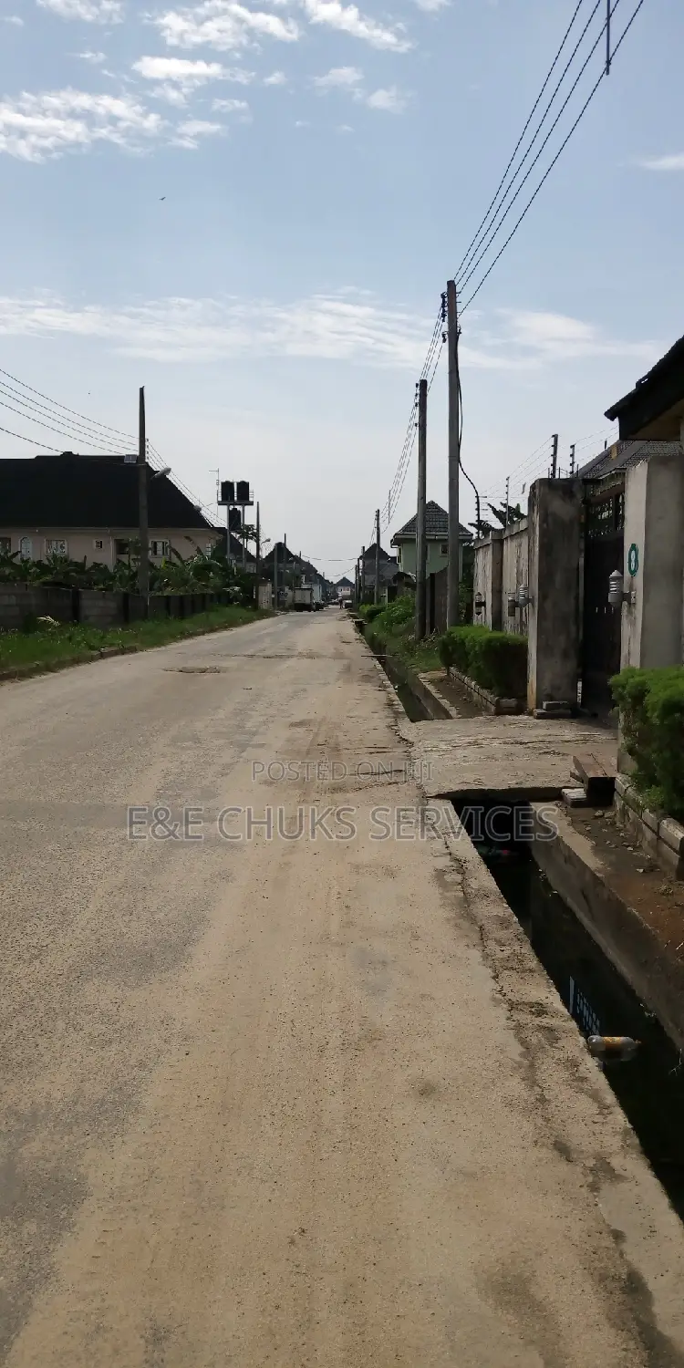 Buy and Build 1 Plot of Land at Shell Cooperative