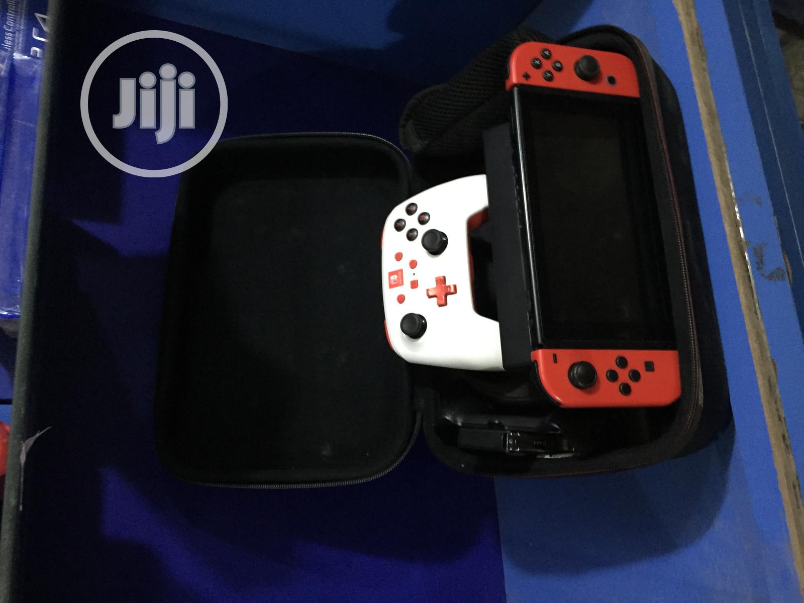 Nintendo Switch New + 12 Latest Games + Extra Pad