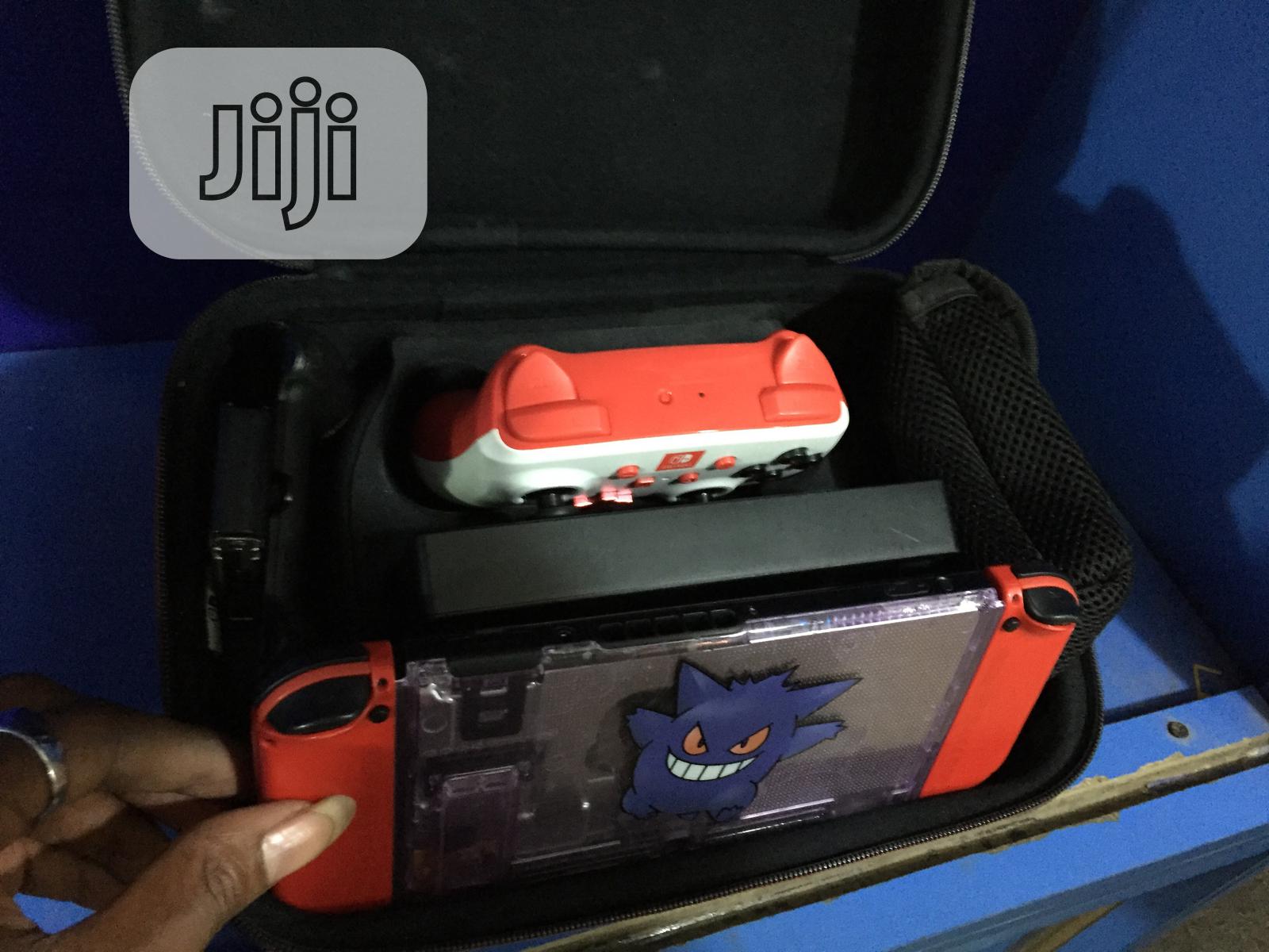 Nintendo Switch New + 12 Latest Games + Extra Pad