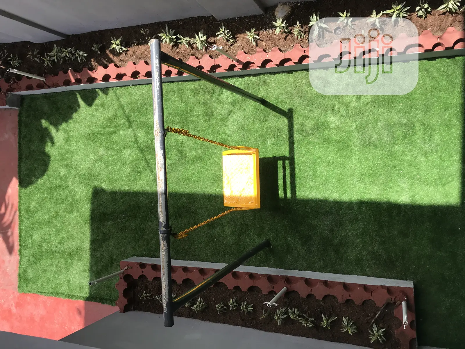 Portable Simple Garden Transformed With Green Grass Rugs Outdoor