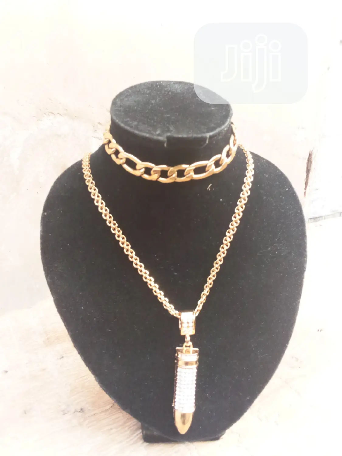 Your Gold Necklace and the Handchain.