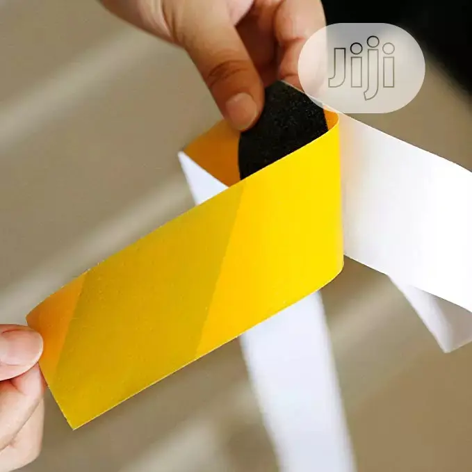 A Roll Of This 2'' Adhesive Floor Tape With Gum