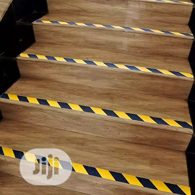 A Roll Of This 2'' Adhesive Floor Tape With Gum