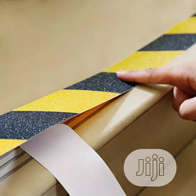 A Roll Of This 2'' Adhesive Floor Tape With Gum