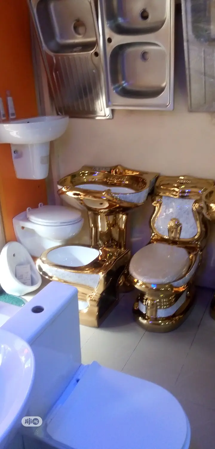 Executive Gold Water Closets.