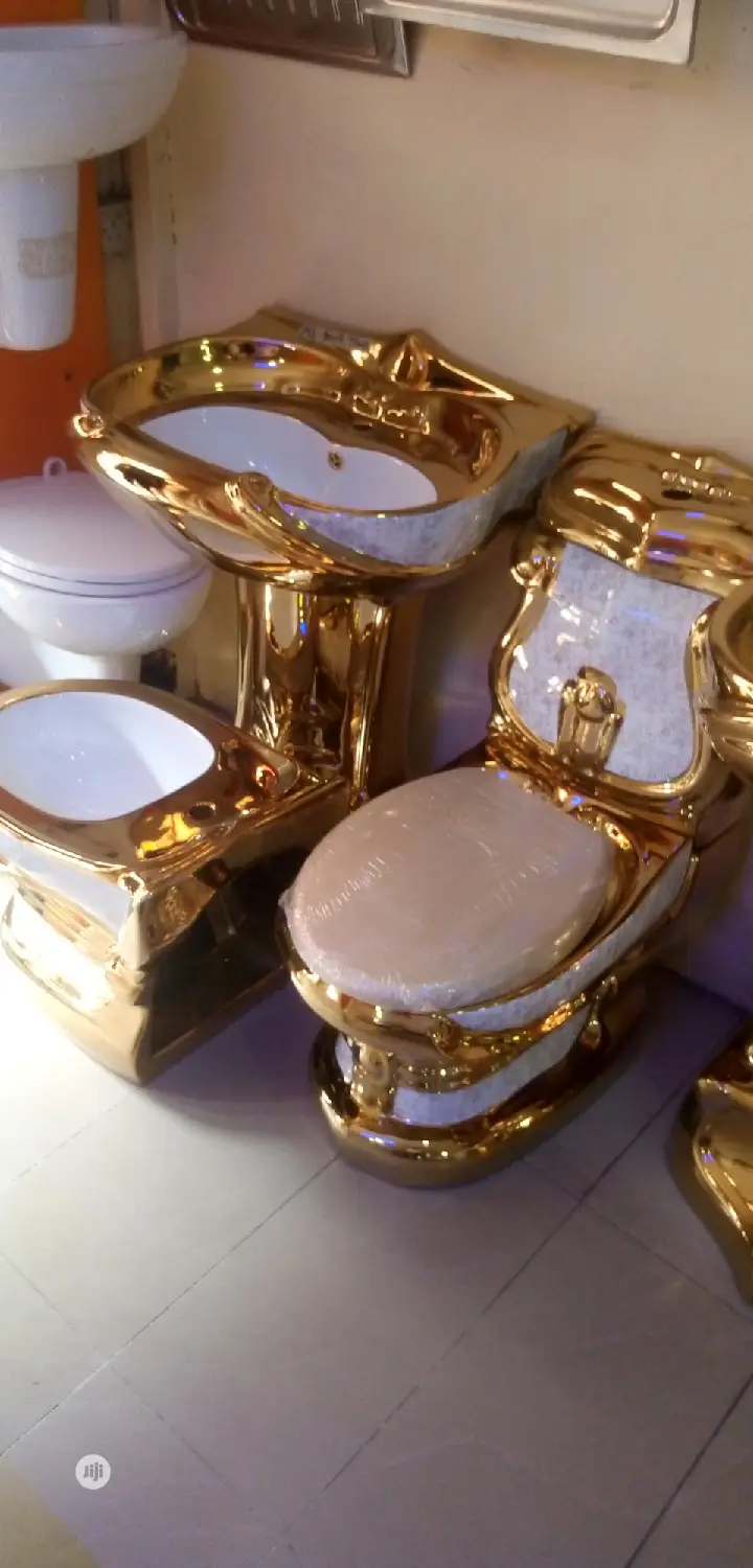 Executive Gold Water Closets.