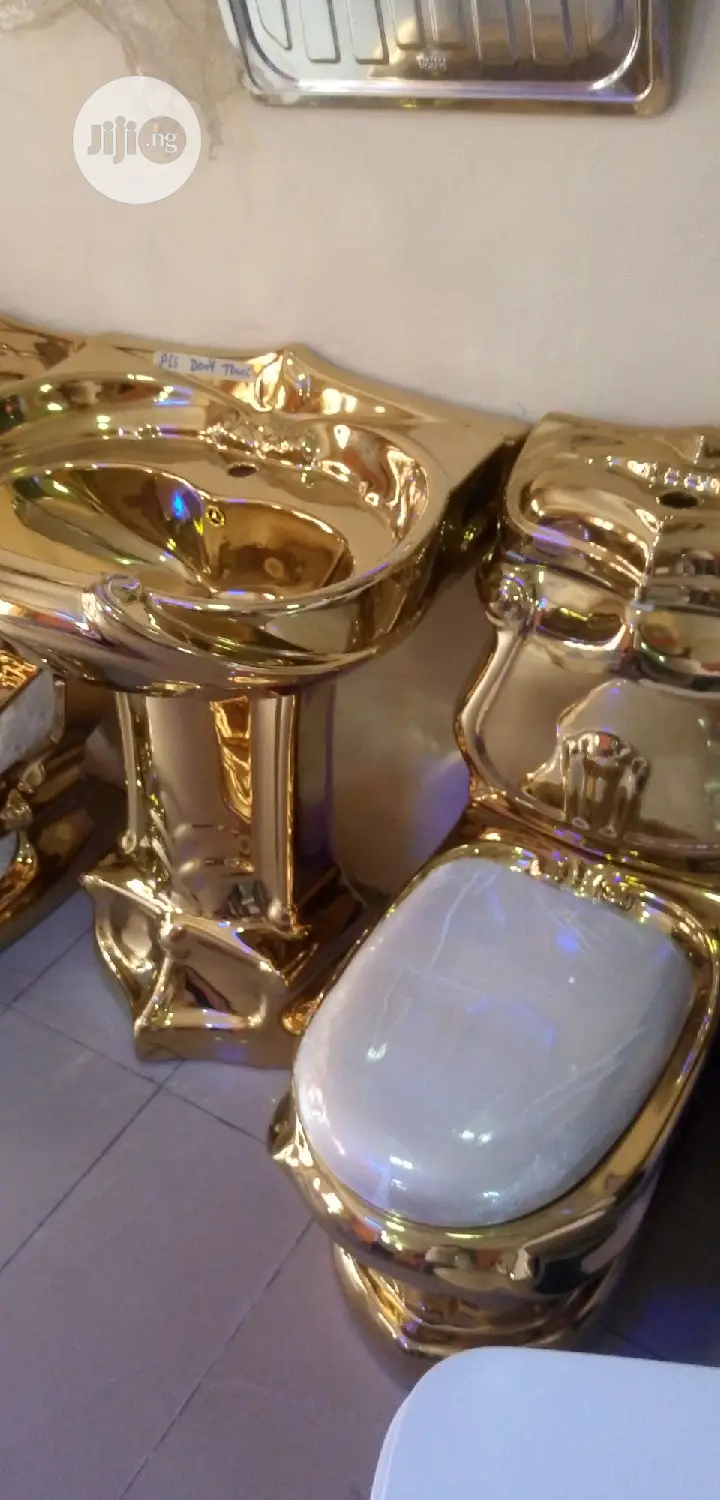 Executive Gold Water Closets.