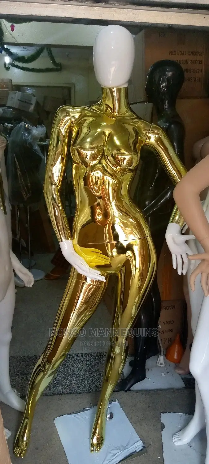 Gold and White Faceless Female Mannequin
