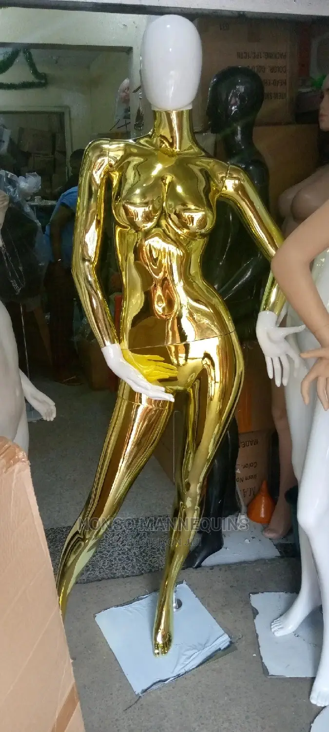 Gold and White Faceless Female Mannequin