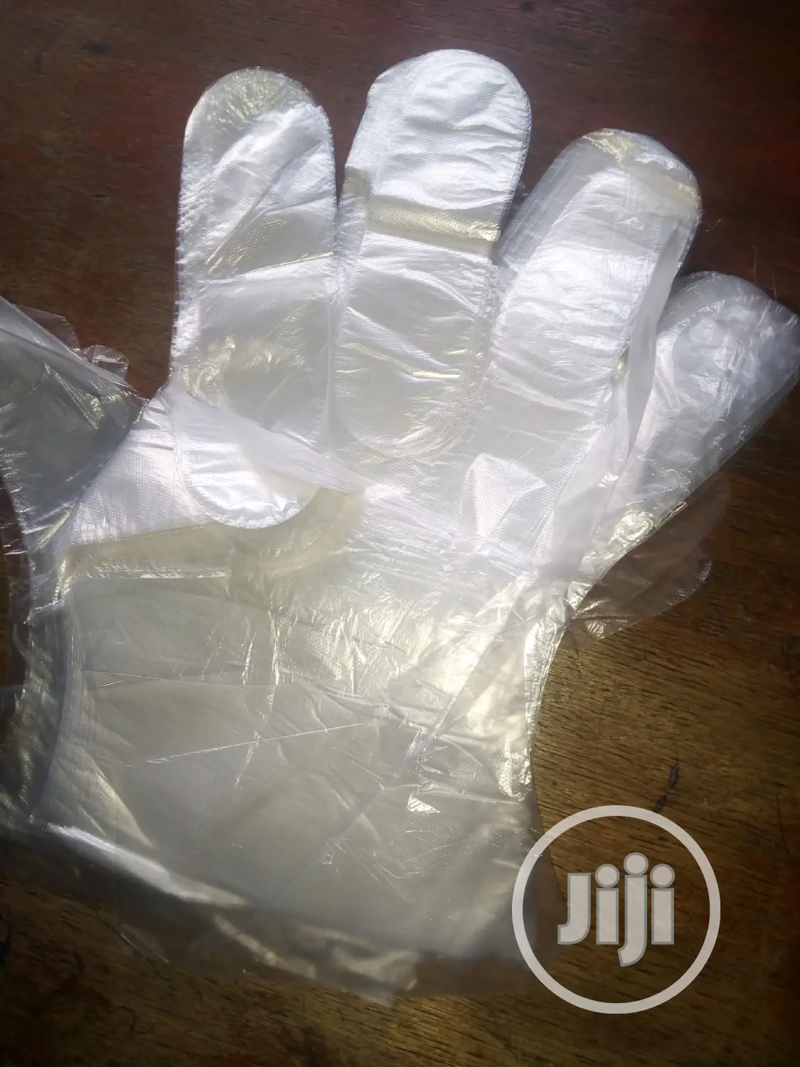 Disposable Nylon Handglove.