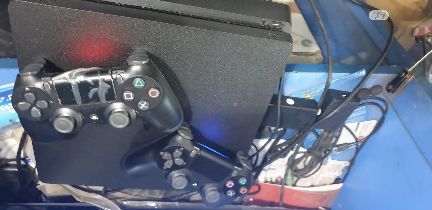 Ps4 Slim Console With 2 Controllers & Fc25 And 10games
