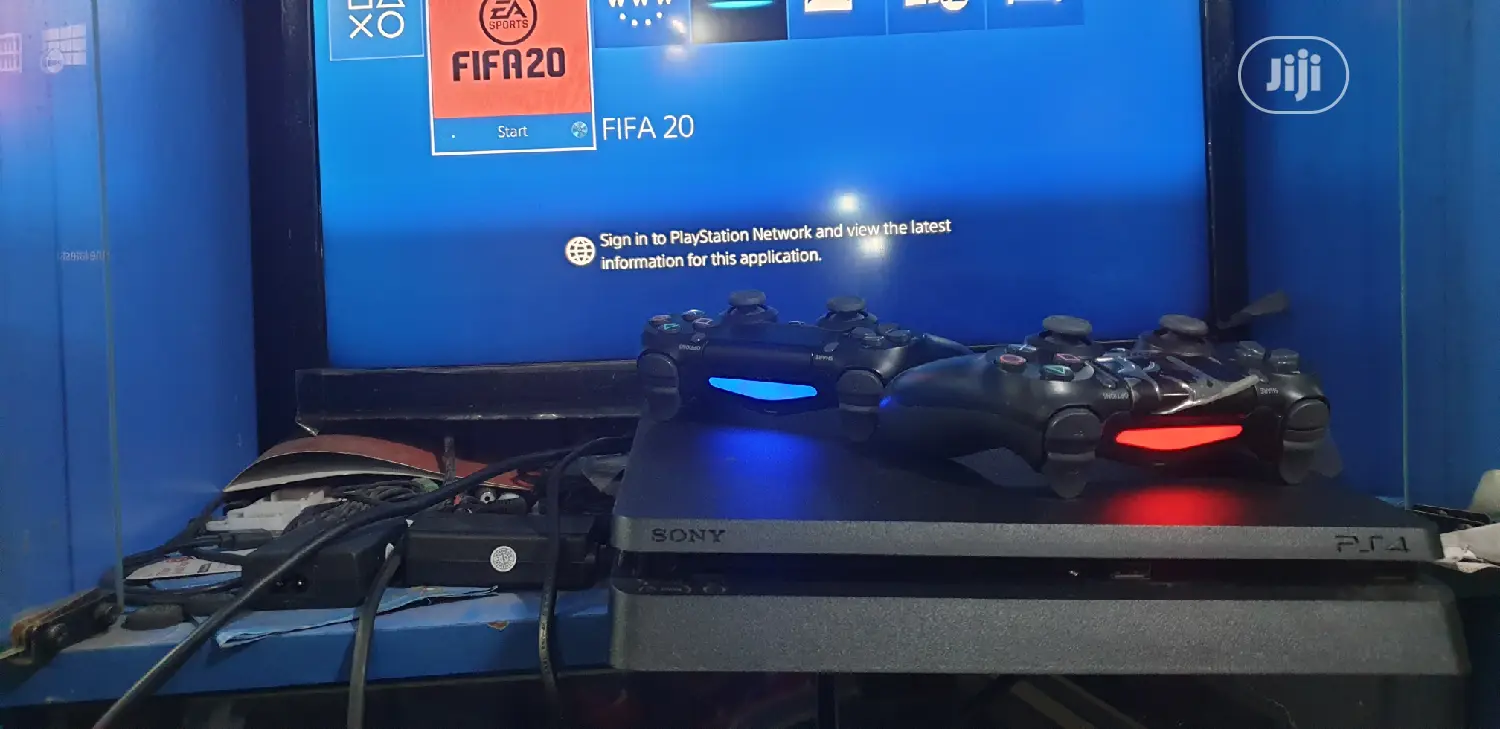 Ps4 Slim Console With 2 Controllers & Fc25 And 10games