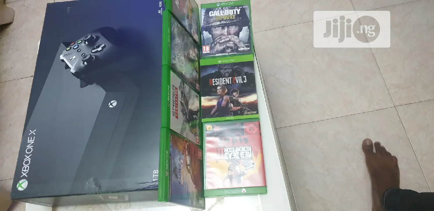 Microsoft Xbox One X 1TB With 8 Latest Game Cd